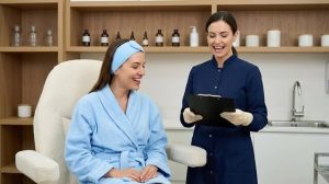 Skilled injectable provider consulting with a patient before Botox or filler treatment